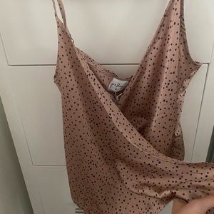 Rose gold and navy polka dot wrap top. SIZE US 10